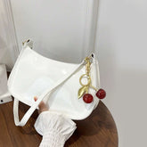Tienda online, Moda femenina, Diseño minimalista, Bolso mujer, Bolso moderno, Bolso elegante, Bolso de mano, Bolso de hombro, Accesorios mujer, Acabado brillante
