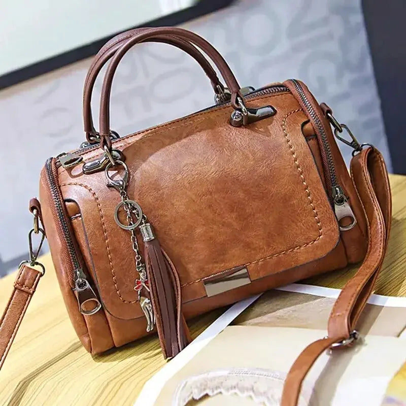 Tienda online, Moda femenina, Flecos decorativos, Bolso mujer, Bolso elegante, Bolso de hombro, Bolso con cremallera, Bolso Boston, Bolso bandolera, Accesorios mujer
