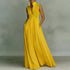 Vestido largo, Vestido elegante, Vestido bohemio, Tienda online, Sin mangas, Ropa femenina, Outfit boho, Moda mujer, Corte holgado, Botones
```