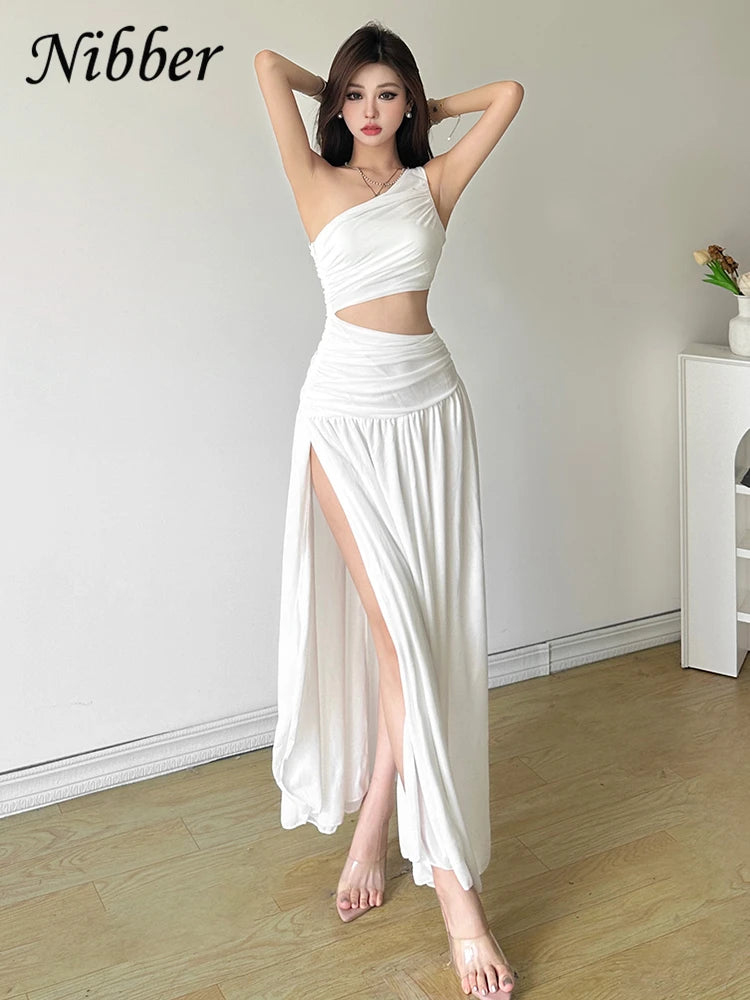 Vestido elegante, Vestido crema, Vestido Atenea, Tienda online, Ropa femenina, Outfit chic, Ocasiones especiales, Moda mujer, Moda femenina, Elegancia asimétrica, Conjunto Corse Hannie
